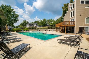 Pool & Sundeck With Lounge Chairs